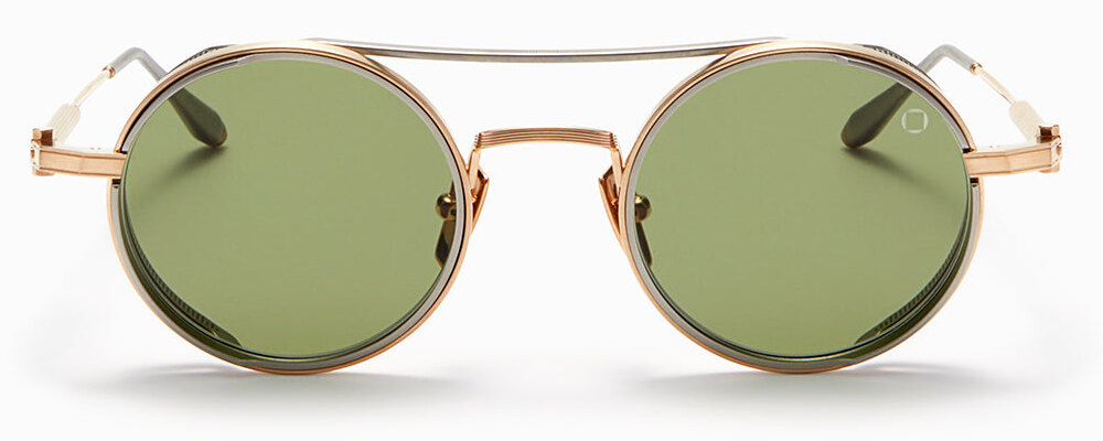 Akoni Eris, brushed white gold and matte black palladium, dark olive lenses